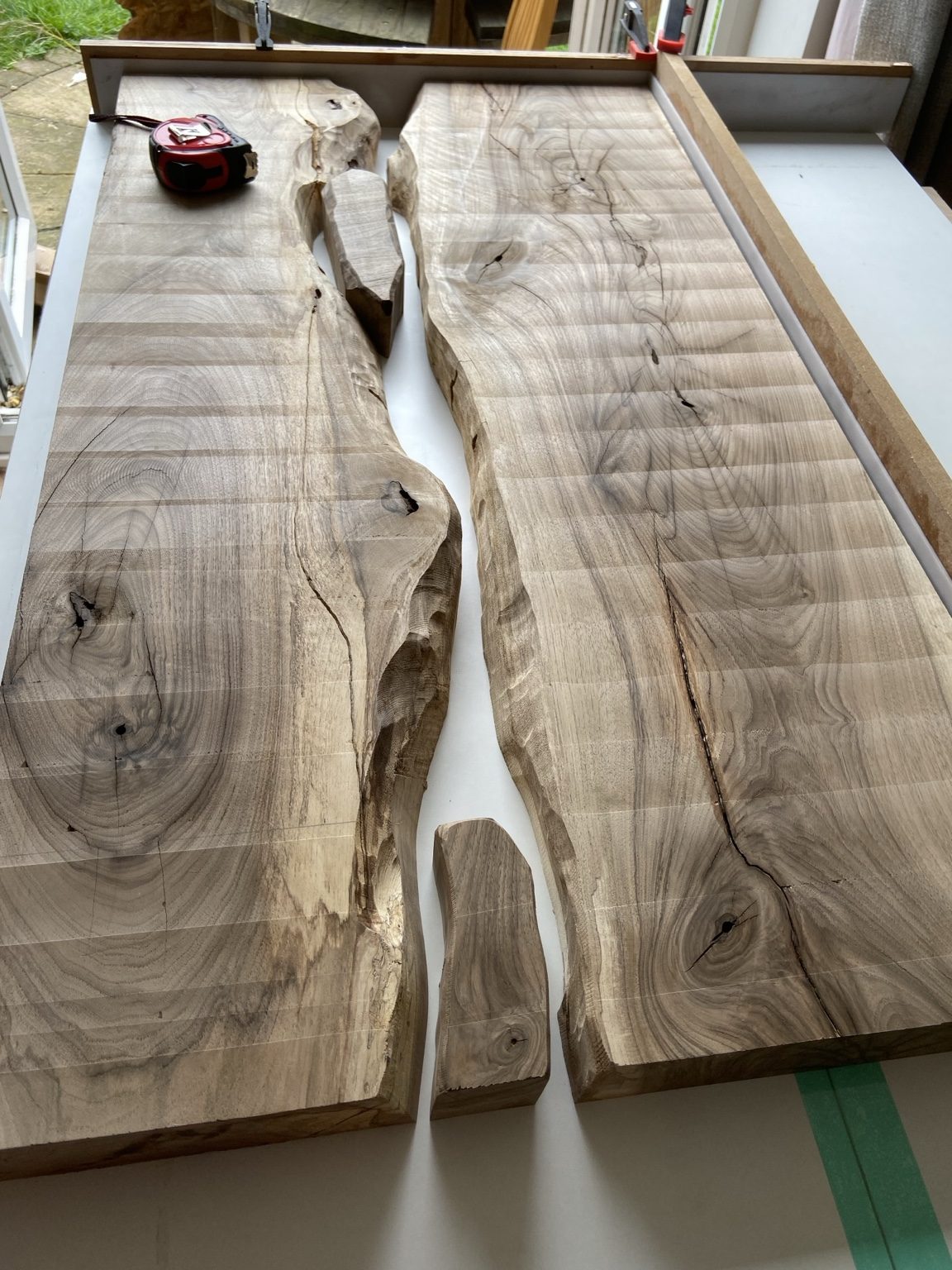 Raw timber slabs prepared for resin work